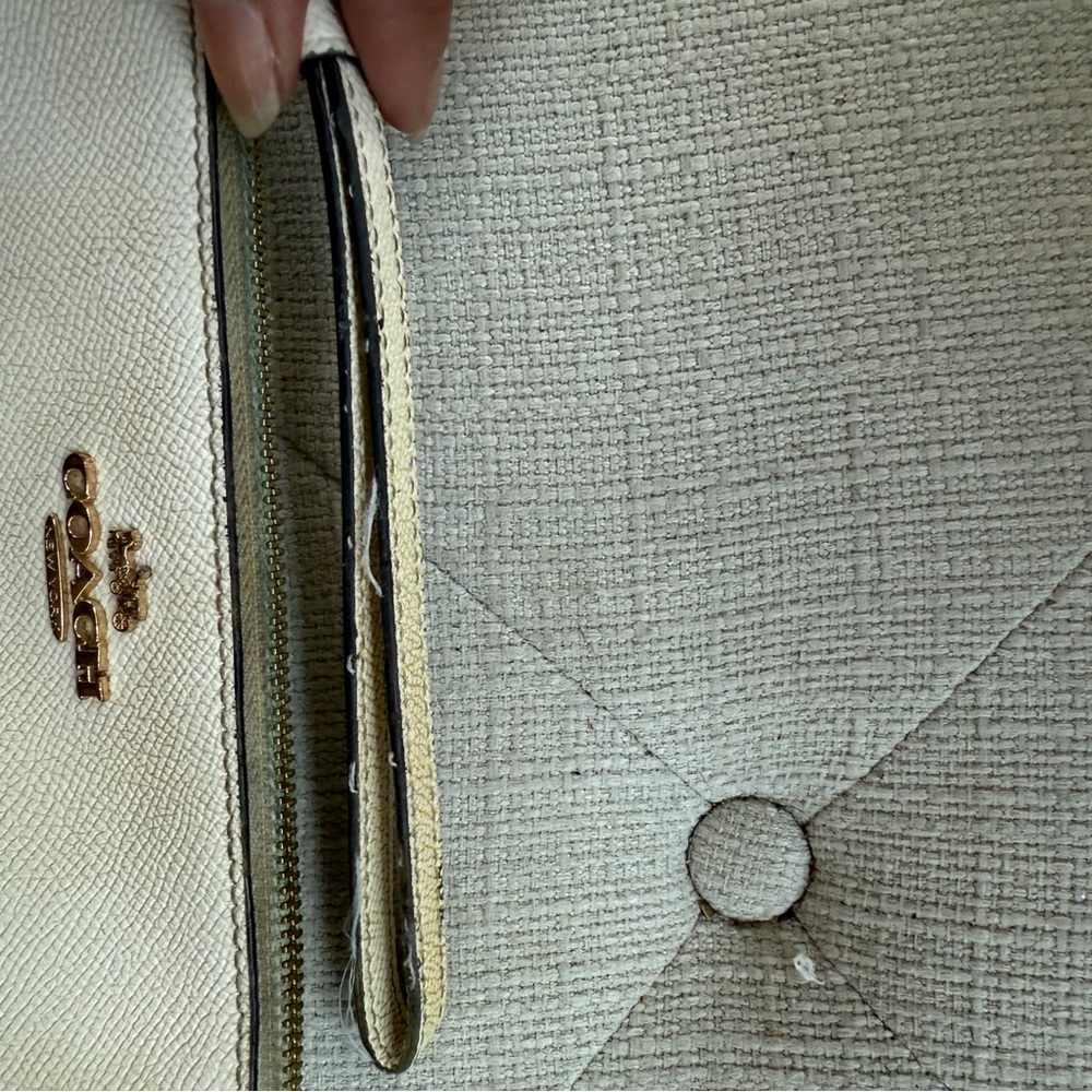 Coach Cream Leather Wristlet with Gold Logo and Dark Trim - Picture 2 of 5